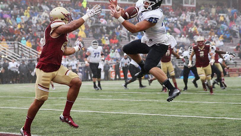 CHESTNUT HILL, MA - OCTOBER 01: Mason Schreck #85 of the Buffalo Bulls attempts to make a catch with pressure from Matt Milano #28 of the Boston College Eagles during the second quarter at Alumni Stadium on October 1, 2016 in Chestnut Hill, Massachusetts. (Photo by Maddie Meyer/Getty Images)