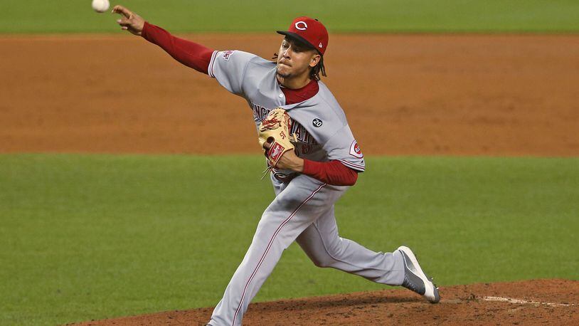 Cincinnati Reds pitcher Luis Castillo works during the third inning against the Miami Marlins at Marlins Park in Miami on Tuesday, Aug. 27, 2019. (David Santiago/Miami Herald/TNS)