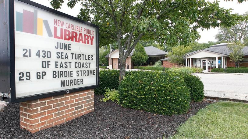 The New Carlisle Public Library is asking local governments to support changing the local split of the state’s public library funding to help it expand after the Clark County Public Library denied its request. BILL LACKEY/STAFF