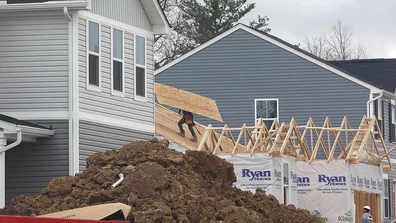 Houses are still being built Friday, April 8, 2022 in the Bridgewater development in Springfield Township. BILL LACKEY/STAFF