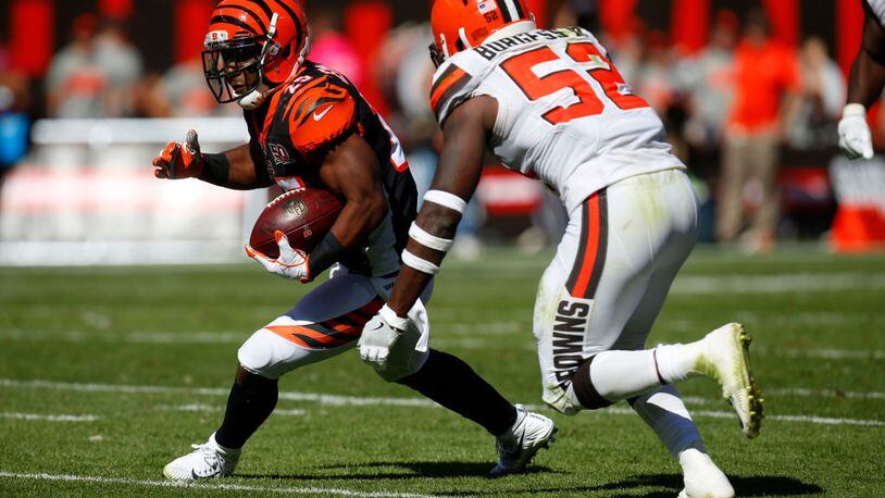 CLEVELAND, OH - OCTOBER 01: Giovani Bernard #25 of the Cincinnati Bengals runs the ball against James Burgess #52 of the Cleveland Browns in the second half at FirstEnergy Stadium on October 1, 2017 in Cleveland, Ohio. (Photo by Justin Aller /Getty Images)