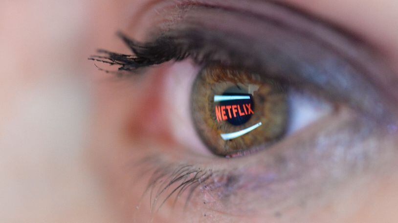 PARIS, FRANCE - SEPTEMBER 19: In this photo illustration the Netflix logo is reflected in the eye of a woman on September 19, 2014 in Paris, France. (Photo by Pascal Le Segretain/Getty Images)