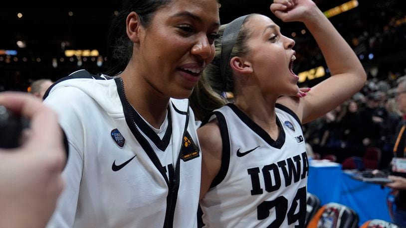 Iowa guard Gabbie Marshall (24) walks off the court after a Final Four college basketball game against UConn in the women's NCAA Tournament, Friday, April 5, 2024, in Cleveland. Iowa won 71-69. (AP Photo/Morry Gash)