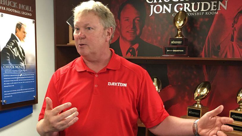 Dayton football coach Rick Chamberlin talks to reports on Thursday at UD. David Jablonski/Staff