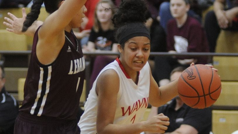 Wayne’s Olivia Trice (with ball), a starting junior guard, is the daughter of Warriors girls coach Travis Trice. MARC PENDLETON / STAFF