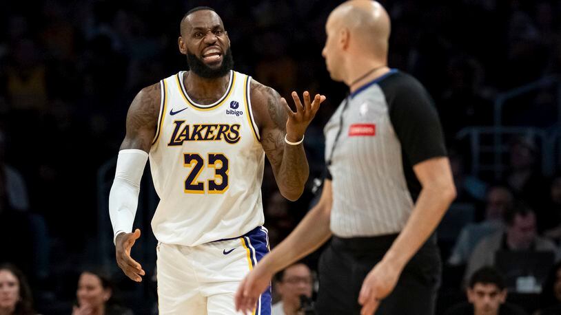 Los Angeles Lakers forward LeBron James (23) reacts after being called for a foul during the second half of an NBA basketball game against the Cleveland Cavaliers, Saturday, April 6, 2024, in Los Angeles. (AP Photo/William Liang)