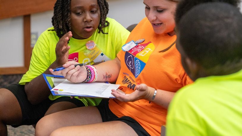 A counselor talks with participants in a Springfield Promise Neighborhood summer camp in this 2023 photo. CONTRIBUTED