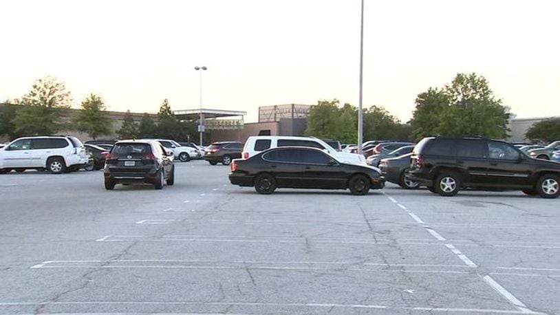 Nearly 100 cars were broken into at a Georgia mall, police said.