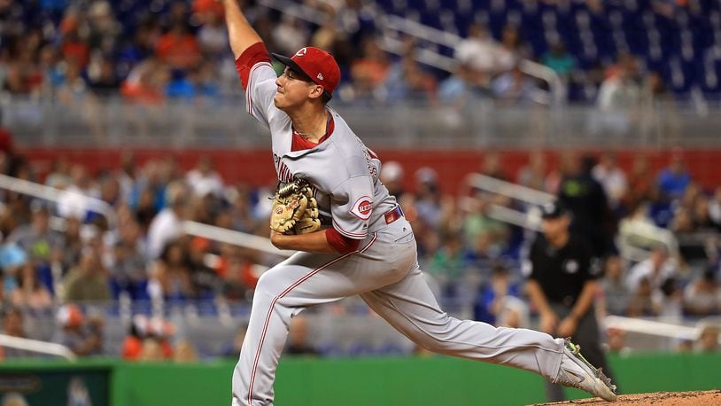 MIAMI, FL - JULY 27: Robert Stephenson #55 of the Cincinnati Reds pitches during a game against the Miami Marlins at Marlins Park on July 27, 2017 in Miami, Florida. (Photo by Mike Ehrmann/Getty Images)
