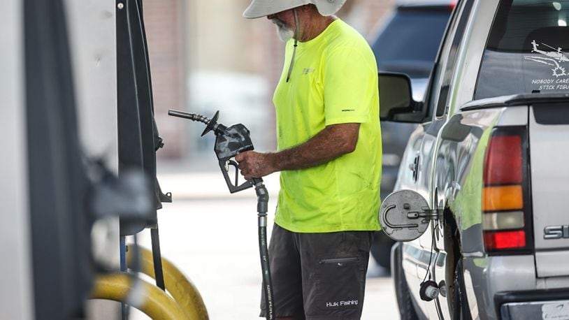 Ron Roberson of Dayton fills up his pick-up truck Wednesday, Aug. 16, 2023 at the UDF on Brown Street. As of midweek, gas prices had risen for five consecutive weeks and the price per gallon was almost as high as a year ago. Roberson paid nearly $100 to fill the tank of his vehicle. JIM NOELKER/STAFF