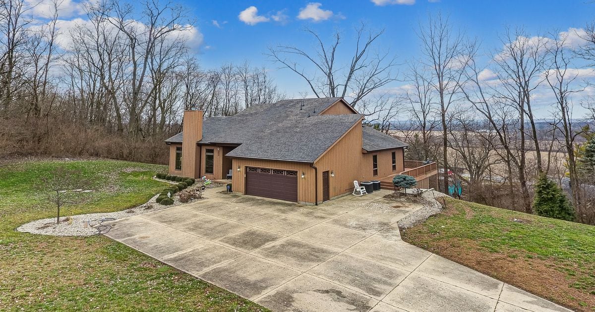 2-story home on hill overlooks 3 acres