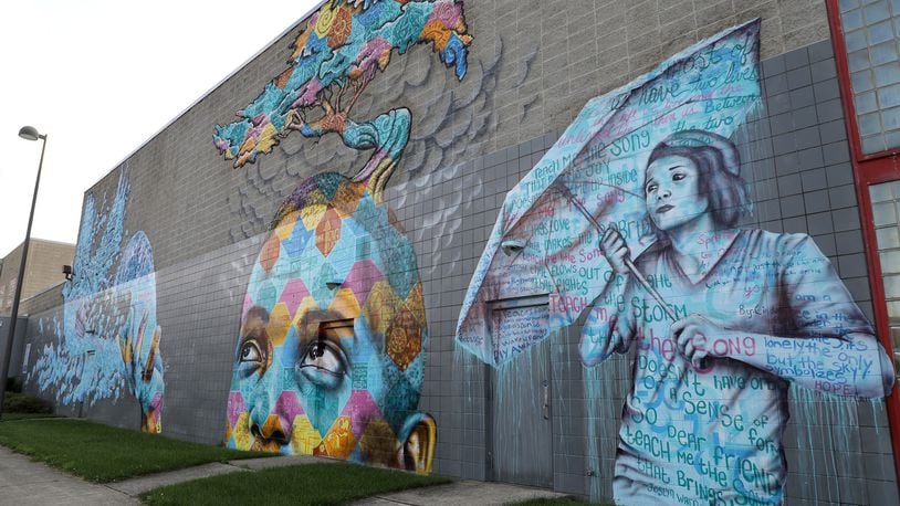 The mural on the side of the Springfield YMCA was created through a partnership between Project Jericho, Springfield Family YMCA and the Clark County Juvenile Court along with artist Joel Bergner. BILL LACKEY/STAFF