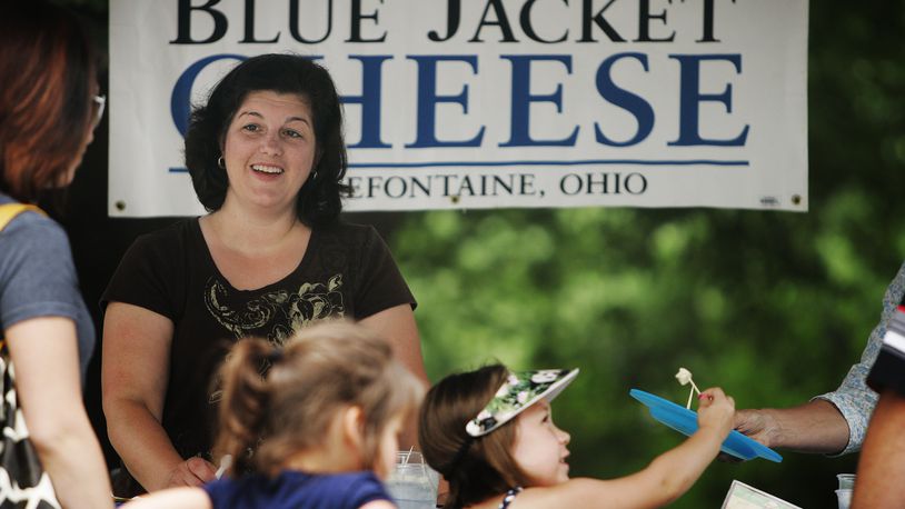 Angel King, owner of Blue Jacket Cheese, sells her products at an area farmer’s market. She and her husband own a dairy farm in Bellfontaine and they just won an award at the Ohio State Fair for their cheese. Jim Noelker/Dayton Daily News
