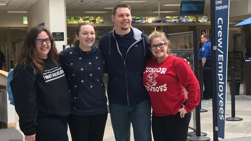 Students and Springfield Government teacher Zach Raines are shown at the Dayton Airport before heading to Washington D.C. Thursday for the presidential inauguration. Contributed photo
