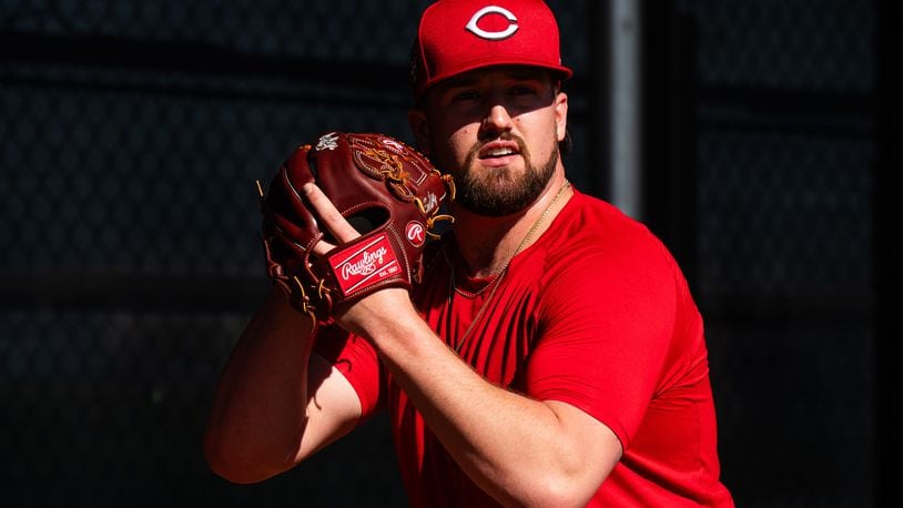 Cincinnati Reds pitcher Graham Ashcraft prepares to throw a pitch during the team's first workout of Spring Training for pitchers and catchers on Wednesday in Goodyear, Ariz. Cincinnati Reds photos