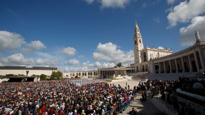 Crowds of worshippers gather during a mass with Pope Francis at the Sanctuary of Fatima  on Saturday in Portugal.
