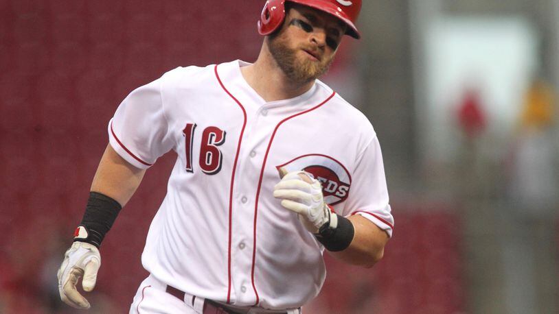 The Reds' Tucker Barnhart rounds the bases after a grand slam in the first inning against the Marlins on Tuesday, Aug. 16, 2016, at Great American Ball Park in Cincinnati. David Jablonski/Staff