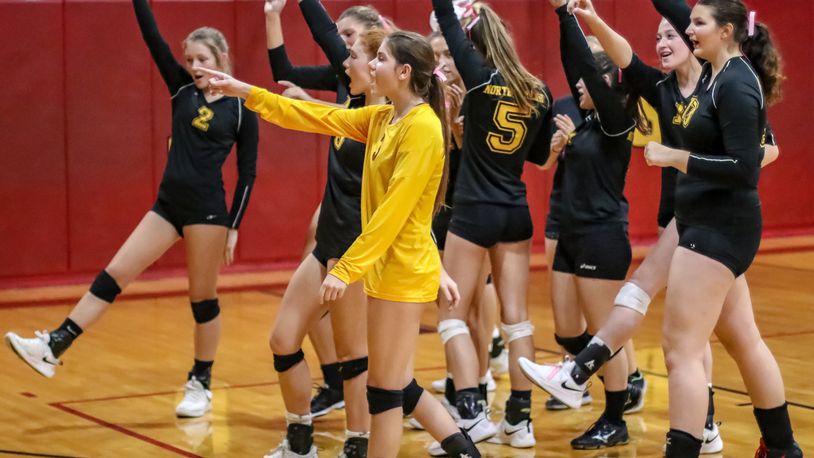 The Northeastern High School volleyball team celebrates after beating Triad in three sets on Tuesday night. The Jets are 17-1 and ranked 20th in Division III. CONTRIBUTED PHOTO BY MICHAEL COOPER