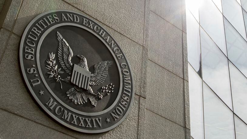 FILE - The seal of the U.S. Securities and Exchange Commission is seen at SEC headquarters, June 19, 2015, in Washington. An auditing firm hired by Trump Media and Technology Group just 37 days ago was busted by the Securities and Exchange Commission for “massive fraud” — though not for any work it performed for former President Donald Trump’s media company. (AP Photo/Andrew Harnik, File)