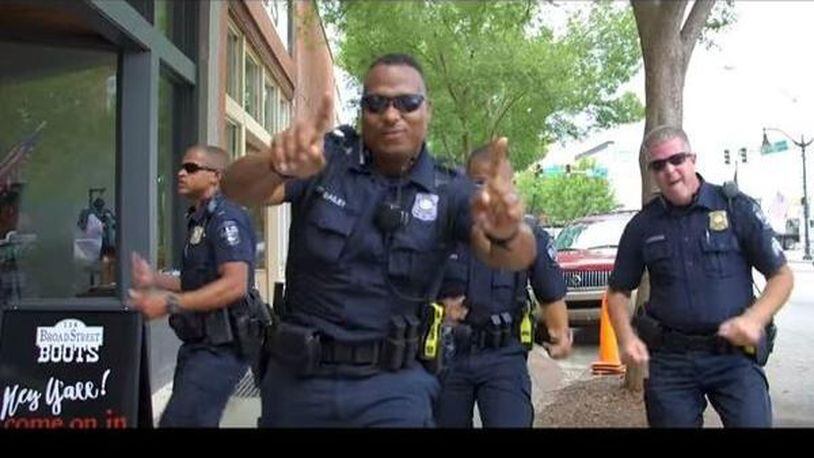 Monroe Police Department is issuing a lip sync challenge to other emergency departments to the song "Uptown Funk!" (Photo: WSBTV.com)
