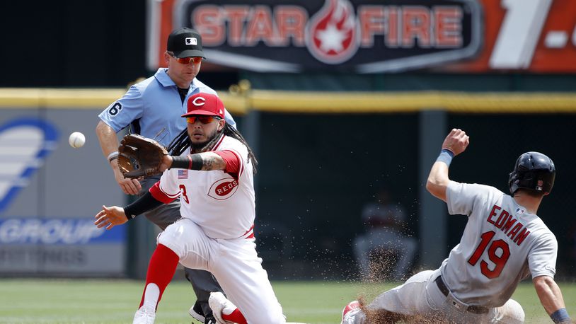 CINCINNATI, OH - AUGUST 18: Tommy Edman #19 of the St. Louis Cardinals steals second base ahead of the throw to Freddy Galvis #3 of the Cincinnati Reds in the first inning at Great American Ball Park on August 18, 2019 in Cincinnati, Ohio. (Photo by Joe Robbins/Getty Images)
