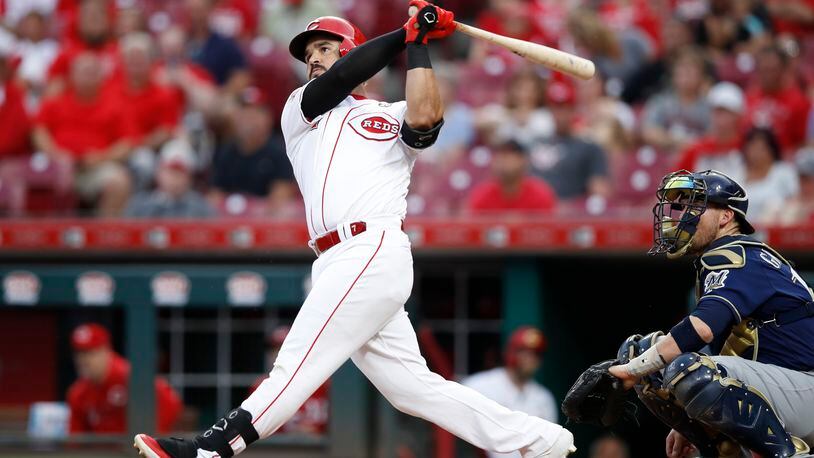 CINCINNATI, OH - SEPTEMBER 25: Eugenio Suarez #7 of the Cincinnati Reds hits a solo home run in the first inning against the Milwaukee Brewers at Great American Ball Park on September 25, 2019 in Cincinnati, Ohio. (Photo by Joe Robbins/Getty Images)