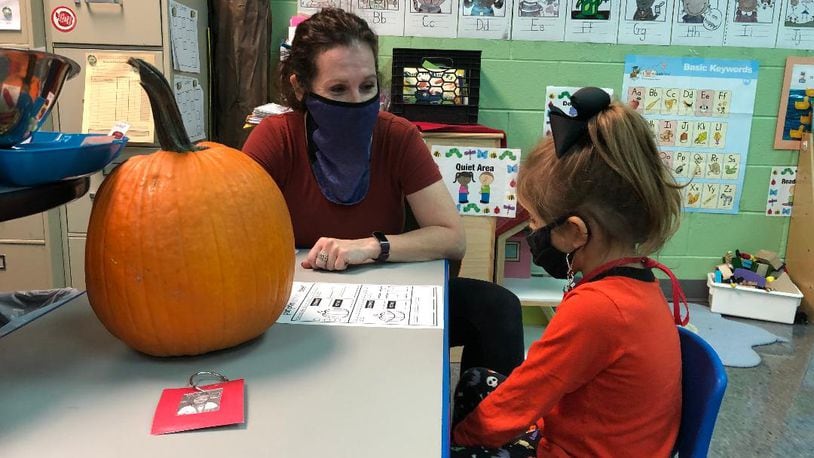 Jill Wuebker, a preschool teacher at Clark Early Learning Center in Springfield, worked with student Juniper Schneider a few years ago. BRETT TURNER/CONTRIBUTED