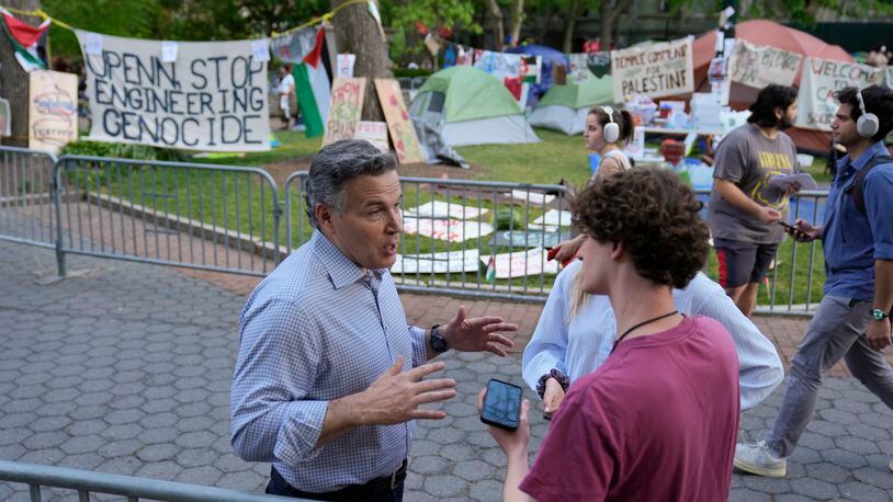 Republican U.S. Senate candidate Dave McCormick speaks outside a Gaza Solidarity Encampment at the University of Pennsylvania in Philadelphia, Wednesday, May 1, 2024. (AP Photo/Matt Rourke)