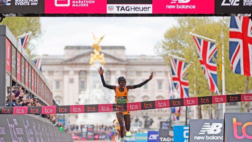 Peres Jepchirchir of Kenya is about to cross the finish line to win the women's race at the London Marathon in London, Sunday, April 21, 2024.(AP Photo/David Cliff)