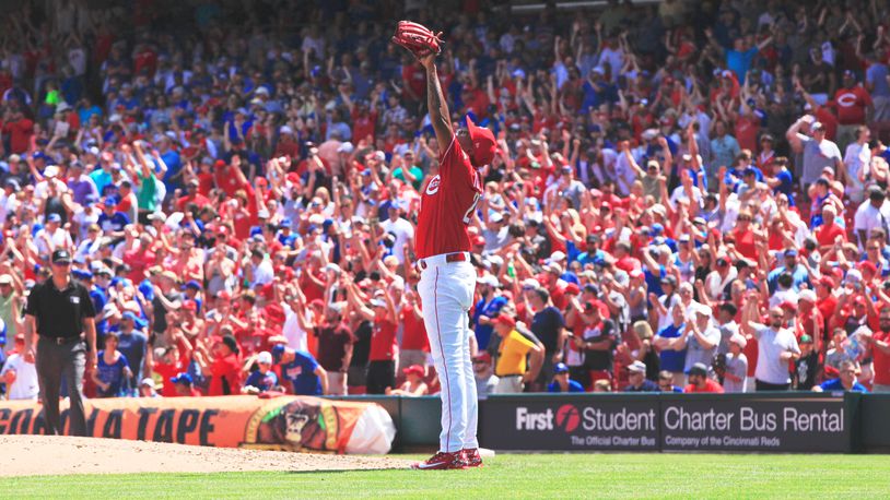 Reds closer Raisel Iglesias celebrates a victory over the Cubs on Sunday, June 24, 2018, at Great American Ball Park in Cincinnati. David Jablonski/Staff