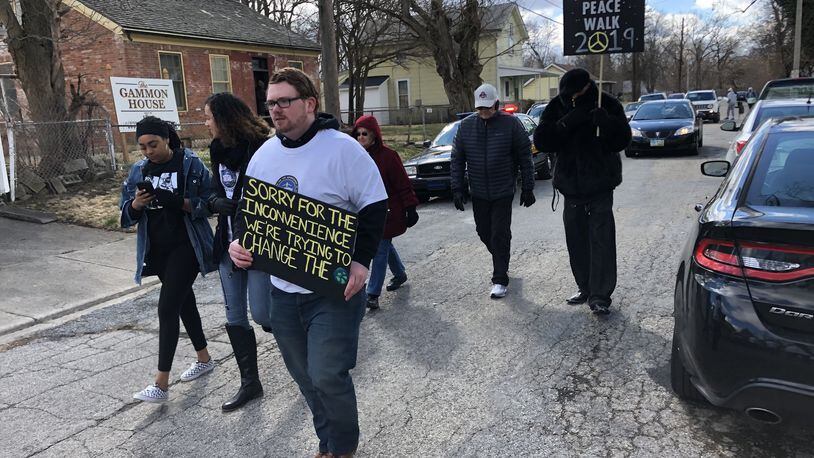 Around 20 people Saturday joined the first Springfield NAACP peace walk to celebrate nonviolence and to stand with the Muslim community. The walk started at the historic Gammon House in downtown Springfield. BRETT TURNER/CONTRIBUTED