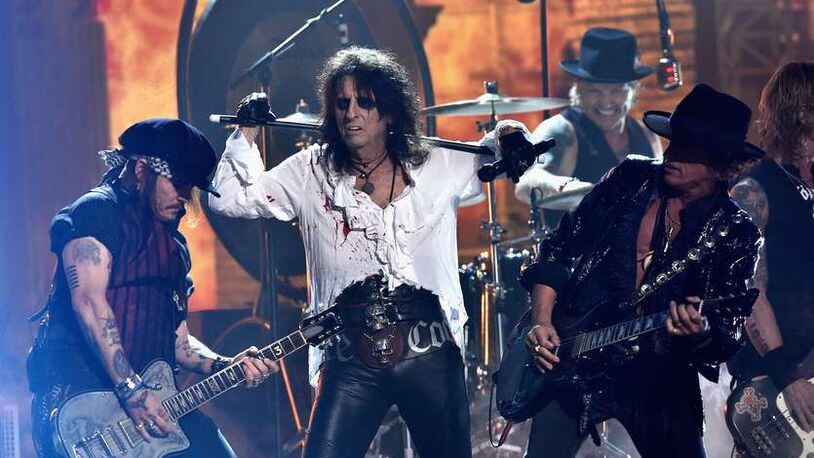LOS ANGELES, CA - FEBRUARY 15: (L-R) Actor/musician Johnny Depp, singer Alice Cooper and musician Joe Perry of Hollywood Vampires perform onstage during The 58th GRAMMY Awards at Staples Center on February 15, 2016 in Los Angeles, California. (Photo by Kevork Djansezian/Getty Images for NARAS)
