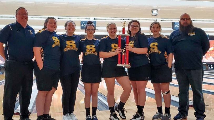 The Springfield High School girls bowling team poses with the trophy after winning the program’s first-ever Clark County Championship on Jan. 11 at Northridge Lanes. CONTRIBUTED PHOTO