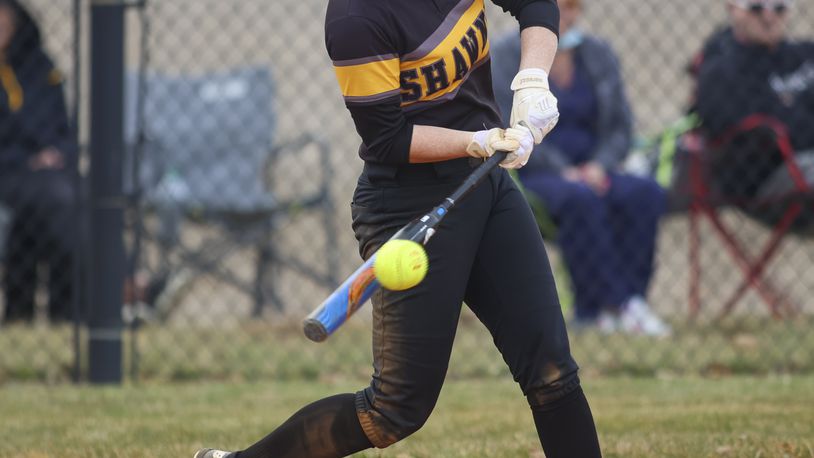 Shawnee High School junior Dani Ross connects with a pitch during a recent scrimmage game against Sidney on March 22 in Springfield. Michael Cooper/CONTRIBUTED