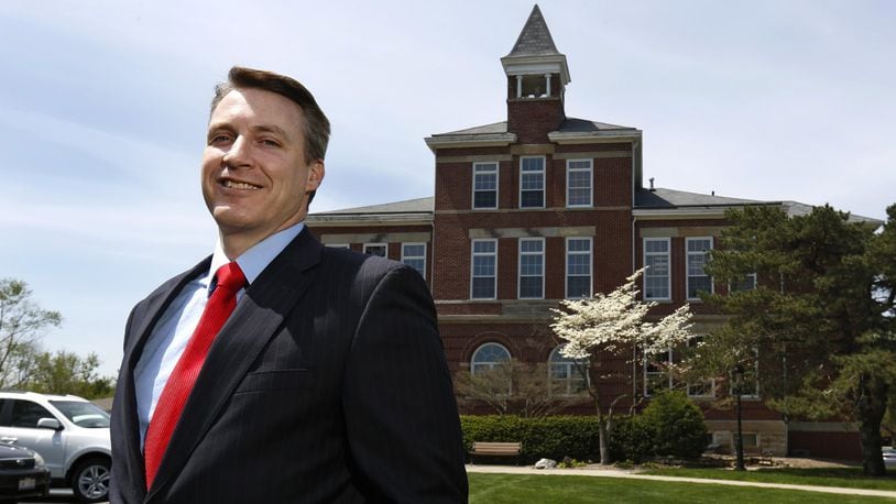 Thomas White, president of Cedarville University with Founders Hall in the background on May 6, 2014. (Columbus Dispatch photo by Tom Dodge)