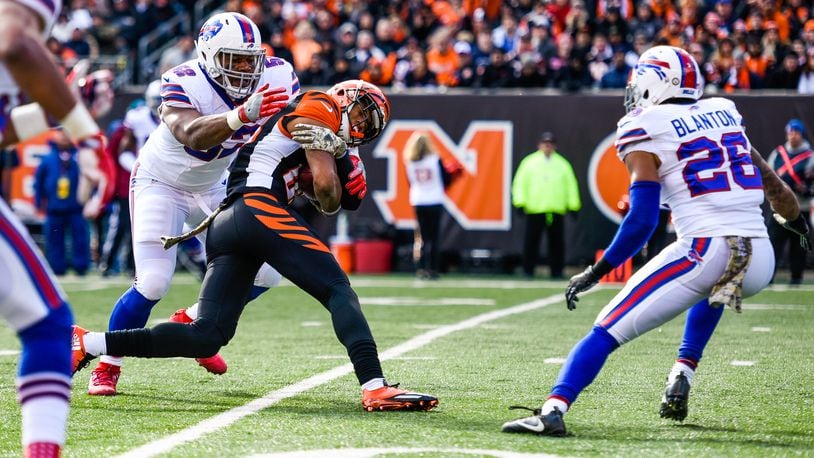 Cincinnati Bengals wide receiver Tyler Boyd is tackled by Buffalo Bills’ Preston Brown during their 16-12 loss to the Buffalo Bills Sunday, Nov. 20 at Paul Brown Stadium in Cincinnati. Woods was injured on the play. NICK GRAHAM/STAFF