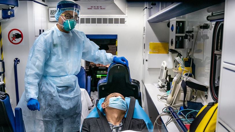 A patient is transferred by an ambulance to the Infectious Disease Centre of Princess Margaret Hospital on January 22, 2020 in Hong Kong, China. (Anthony Kwan/Getty Images)