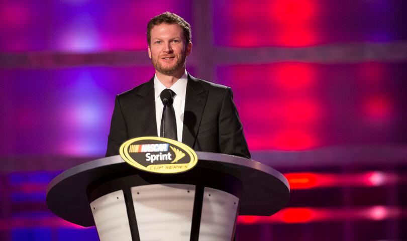 What will be higher? Dale Earnhardt Jr. finishing position in the Daytona 500 or Russell Wilson's longest rush in the game?