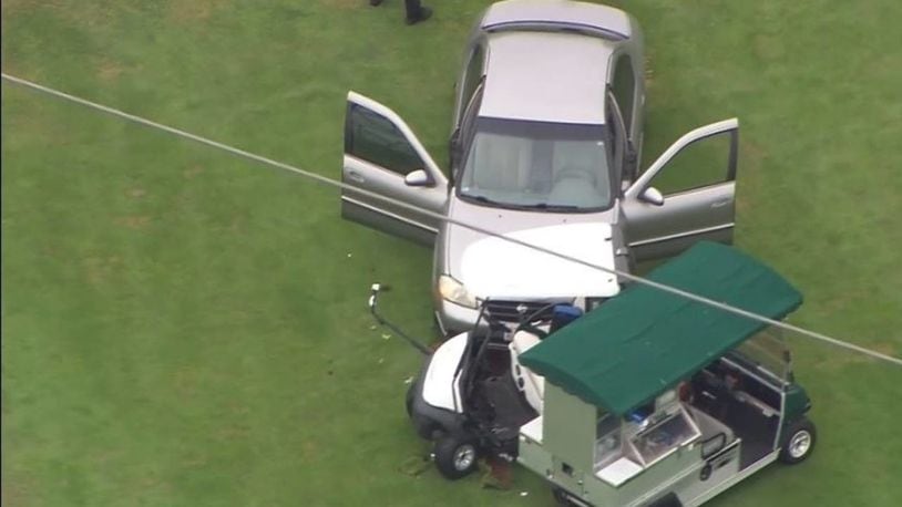 A woman allegedly used her car to strike two carts at a golf course in Lacey, Washington.