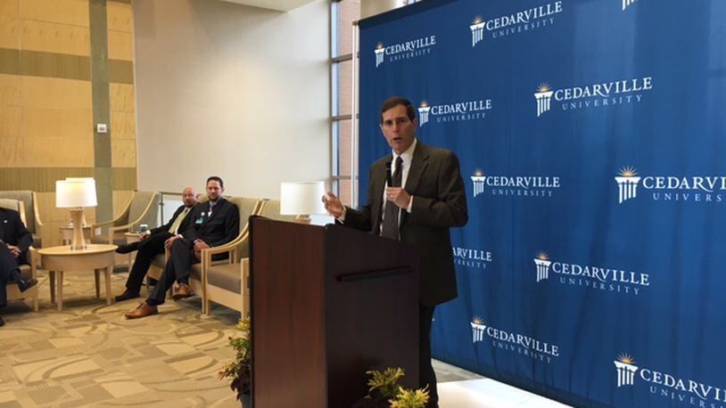 Jeffrey Haymond, dean of Cedarville’s School of Business Administration, at Thursday’s press conference. THOMAS GNAU/STAFF