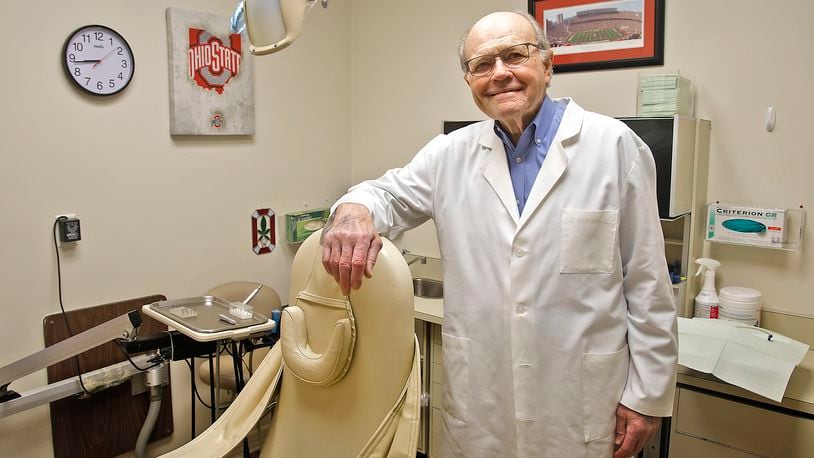 Dr. Dale Hazelbaker is stepping away from his Springfield dental practice after more than 61 years. Hazelbaker said he plans to spend more time skiing and bicycling. BILL LACKEY/STAFF
