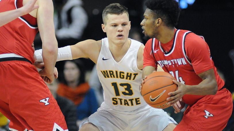 Wright State’s Grant Benzinger guards Youngstown State’s Cameron Morse in a game at the Nutter Center last season. KEITH COLE/CONTRIBUTED PHOTO