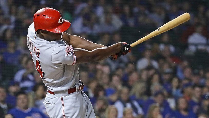 CHICAGO, ILLINOIS - SEPTEMBER 17: Aristides Aquino #44 of the Cincinnati Reds hits a two run home run in the 1st inning against the Chicago Cubs at Wrigley Field on September 17, 2019 in Chicago, Illinois. (Photo by Jonathan Daniel/Getty Images)