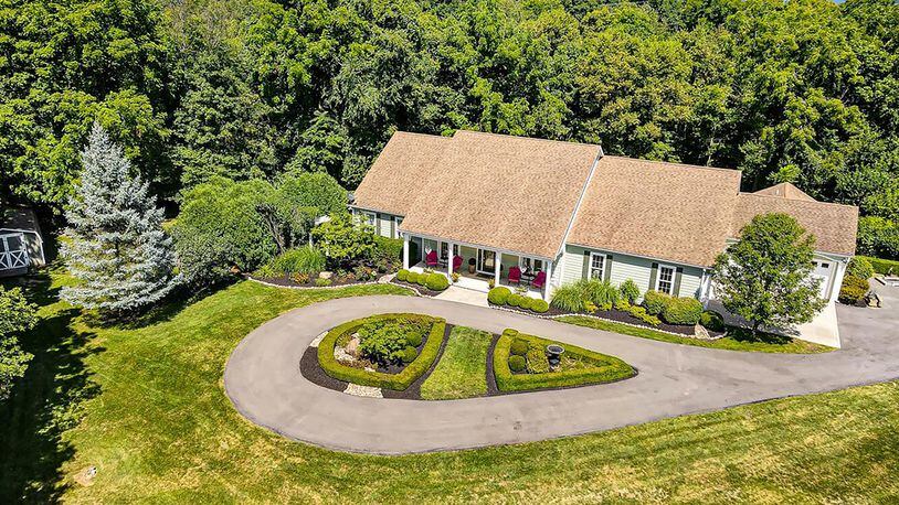 The 4-bedroom, Cape Cod-style home has about 3,580 sq. ft. of living space with an attached, 4-car garage and a 4-season room. CONTRIBUTED PHOTO