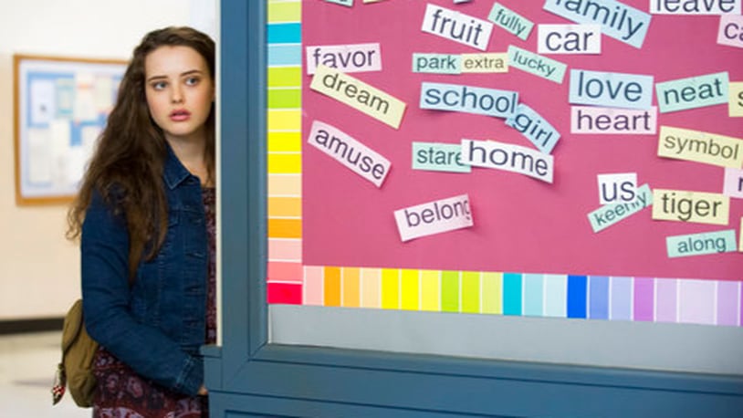This image released by Netflix shows Katherine Langford in a scene from the series, "13 Reasons Why," about a teenager who commits suicide. The stomach-turning suicide scene has triggered criticism from some mental health advocates that it romanticizes suicide and even promoted many schools across the country to send warning letters to parents and guardians. The showâs creators are unapologetic, saying their frank depiction of teen life needs to be âunflinching and raw.â (Beth Dubber/Netflix via AP)