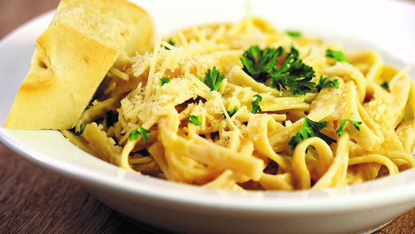Thickened low-fat milk can be used in lieu of heavy cream in dishes like fettuccine alfredo.