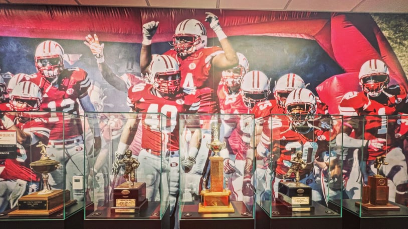 Trophies are pictured in the Wittenberg football coaches' offices on Wednesday, Sept. 14, 2022, in Springfield. David Jablonski/Staff