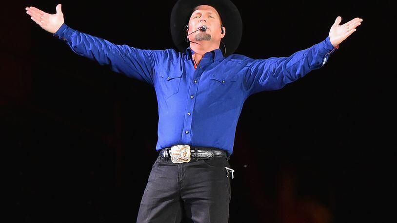 HOT TICKET: Country music icon Garth Brooks and his wife Trisha Yearwood are bringing their world tour to the region. The duo will perform at Bankers Life Fieldhouse in Indianapolis Saturday, Oct. 7 at 7:30 p.m., with tickets going on sale Friday, Aug. 25 at 10 a.m. Tickets are $74.98 and all seats are sold on a best-available basis. There is a purchase limit of eight tickets.. (Photo by Theo Wargo/Getty Images)