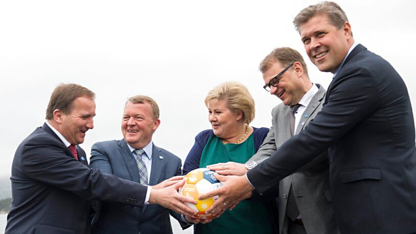 Nordic Prime Ministers, from left, Stefan Lofven of Sweden, Lars Lokke Rasmussen of Denmark, Erna Solberg of Norway, Juha Sipila of Finland and Bjarni Benediktsson of Iceland hold their hands on a soccer ball during a meeting in Bergen, Norway, Monday, May 29 2017. A Norwegian official say five Nordic prime ministers who posed for a photo clutching a soccer ball werenât intending to make fun of a viral image from U.S. President Donald Trumpâs trip to Saudi Arabia. (Marit Hommedal / NTB scanpix via AP)