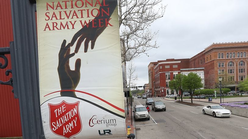 Banners celebrating National Salvation Army Week May 9 -13 decorate the downtown Springfield core block Thursday, May 5, 2022. BILL LACKEY/STAFF